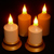 Rechargable Flickering Votive candle shown with base